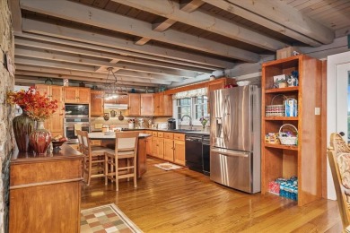The essence of Tennessee Living! Honest Abe Log Home perched on on Hidden Valley Golf and Country Club in Tennessee - for sale on GolfHomes.com, golf home, golf lot