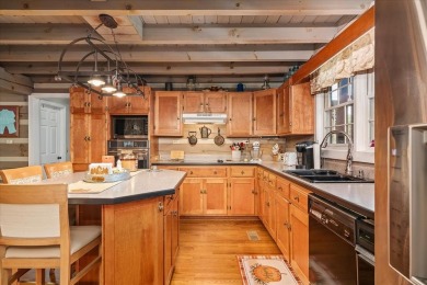The essence of Tennessee Living! Honest Abe Log Home perched on on Hidden Valley Golf and Country Club in Tennessee - for sale on GolfHomes.com, golf home, golf lot