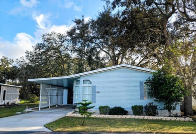 This spacious 3 bdrm,2 bath PALM HARBOR is completely furnished on Southport Springs Golf Club in Florida - for sale on GolfHomes.com, golf home, golf lot