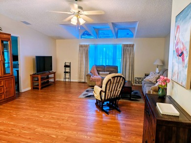 This spacious 3 bdrm,2 bath PALM HARBOR is completely furnished on Southport Springs Golf Club in Florida - for sale on GolfHomes.com, golf home, golf lot