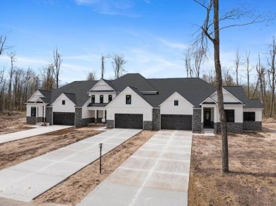 Experience elevated living at 809 Fairways Drive, located in The on Birchwood Farms Golf and Country Club in Michigan - for sale on GolfHomes.com, golf home, golf lot