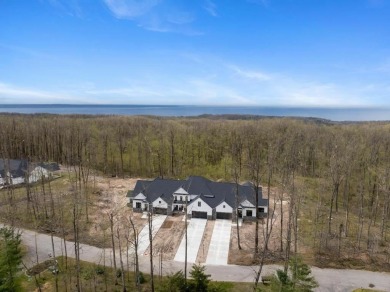 Experience elevated living at 809 Fairways Drive, located in The on Birchwood Farms Golf and Country Club in Michigan - for sale on GolfHomes.com, golf home, golf lot
