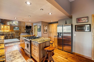 Beautifully upgraded mountain retreat in Pinetop Country Club on Pinetop Lakes Country Club in Arizona - for sale on GolfHomes.com, golf home, golf lot