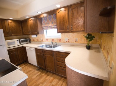 Charming single-level custom home located in the peaceful on Carolina Shores Golf Course in North Carolina - for sale on GolfHomes.com, golf home, golf lot