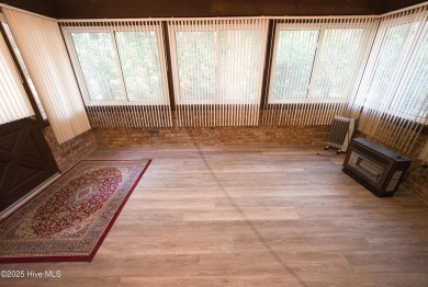 Charming single-level custom home located in the peaceful on Carolina Shores Golf Course in North Carolina - for sale on GolfHomes.com, golf home, golf lot