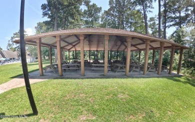 Charming single-level custom home located in the peaceful on Carolina Shores Golf Course in North Carolina - for sale on GolfHomes.com, golf home, golf lot