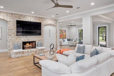 Welcome home to a beautifully revived waterfront estate in gated on Pinnacle Golf and Boat Club in Texas - for sale on GolfHomes.com, golf home, golf lot