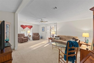 Nestled against a tranquil wooded backdrop, this beautifully on El Diablo Executive Golf Course in Florida - for sale on GolfHomes.com, golf home, golf lot