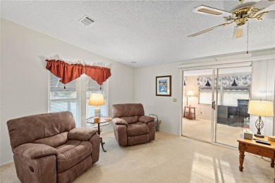 Nestled against a tranquil wooded backdrop, this beautifully on El Diablo Executive Golf Course in Florida - for sale on GolfHomes.com, golf home, golf lot