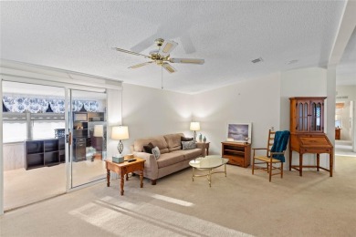 Nestled against a tranquil wooded backdrop, this beautifully on El Diablo Executive Golf Course in Florida - for sale on GolfHomes.com, golf home, golf lot