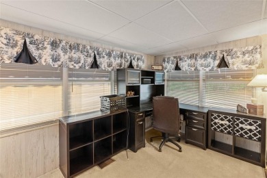 Nestled against a tranquil wooded backdrop, this beautifully on El Diablo Executive Golf Course in Florida - for sale on GolfHomes.com, golf home, golf lot