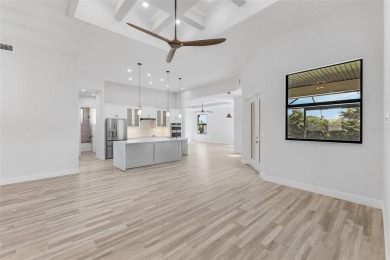 Discover this stunning new construction pool home in the on Burnt Store Golf Club in Florida - for sale on GolfHomes.com, golf home, golf lot