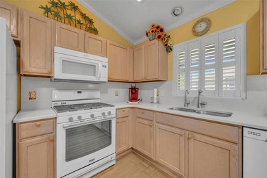 Beautifully maintained TURNKEY home in the heart of The on El Santiago Executive Golf Course in Florida - for sale on GolfHomes.com, golf home, golf lot