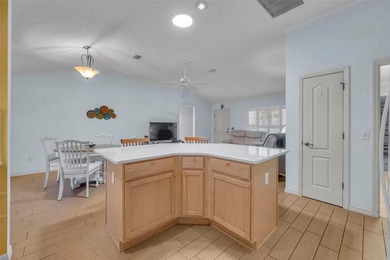 Beautifully maintained TURNKEY home in the heart of The on El Santiago Executive Golf Course in Florida - for sale on GolfHomes.com, golf home, golf lot