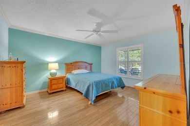 Beautifully maintained TURNKEY home in the heart of The on El Santiago Executive Golf Course in Florida - for sale on GolfHomes.com, golf home, golf lot