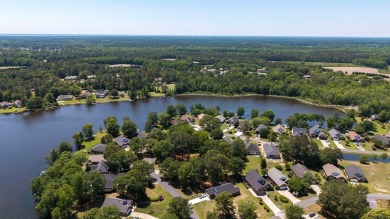 BACK ON THE MARKET - BUYERS HOME SALE FELL APART. Exquisite on Players Course At Wyboo Plantation in South Carolina - for sale on GolfHomes.com, golf home, golf lot