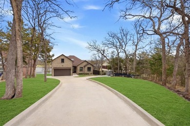 Discover elevated lakefront living in this exceptional custom on Lake Kiowa Golf Course in Texas - for sale on GolfHomes.com, golf home, golf lot
