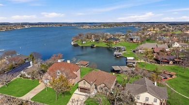 Discover elevated lakefront living in this exceptional custom on Lake Kiowa Golf Course in Texas - for sale on GolfHomes.com, golf home, golf lot