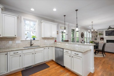 Curb appeal, an open layout, generous sized rooms, walk-in on Heritage Golf Club in North Carolina - for sale on GolfHomes.com, golf home, golf lot