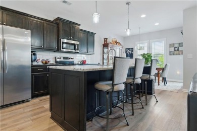 Nestled beside Stone Canyon Golf Course, this immaculate on Stone Canyon Golf Club in Missouri - for sale on GolfHomes.com, golf home, golf lot