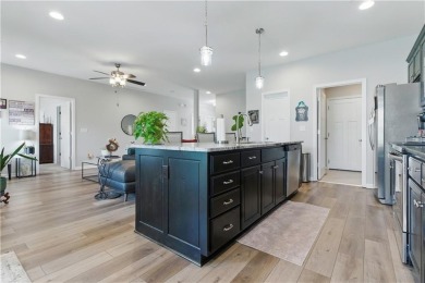 Nestled beside Stone Canyon Golf Course, this immaculate on Stone Canyon Golf Club in Missouri - for sale on GolfHomes.com, golf home, golf lot