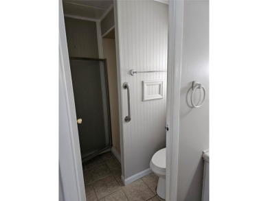 This home is seeking someone to complete the repairs and restore on Pelican Pointe Golf and Country Club in Florida - for sale on GolfHomes.com, golf home, golf lot