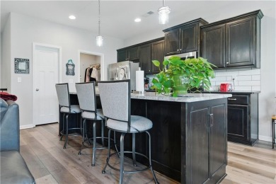 Nestled beside Stone Canyon Golf Course, this immaculate on Stone Canyon Golf Club in Missouri - for sale on GolfHomes.com, golf home, golf lot