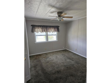This home is seeking someone to complete the repairs and restore on Pelican Pointe Golf and Country Club in Florida - for sale on GolfHomes.com, golf home, golf lot