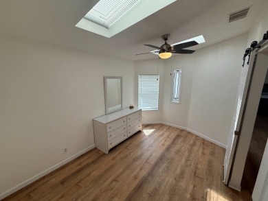 This beautifully renovated 2-bedroom, 2-bathroom, Palm Harbor on Del Tura Golf and Country Club in Florida - for sale on GolfHomes.com, golf home, golf lot