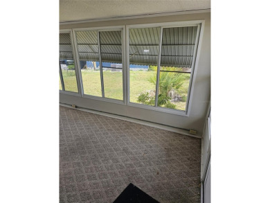 This home is seeking someone to complete the repairs and restore on Pelican Pointe Golf and Country Club in Florida - for sale on GolfHomes.com, golf home, golf lot