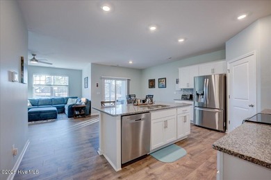 Welcome to 2021 Caracara Drive, located in the gated Fairfield on Harbour Point Golf Club in North Carolina - for sale on GolfHomes.com, golf home, golf lot