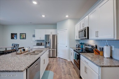 Welcome to 2021 Caracara Drive, located in the gated Fairfield on Harbour Point Golf Club in North Carolina - for sale on GolfHomes.com, golf home, golf lot