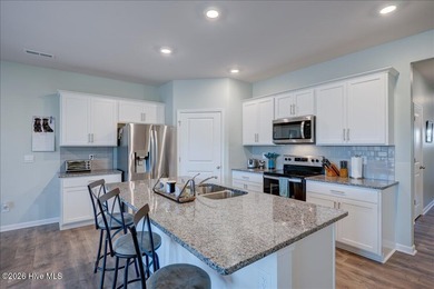 Welcome to 2021 Caracara Drive, located in the gated Fairfield on Harbour Point Golf Club in North Carolina - for sale on GolfHomes.com, golf home, golf lot