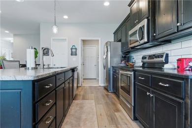 Nestled beside Stone Canyon Golf Course, this immaculate on Stone Canyon Golf Club in Missouri - for sale on GolfHomes.com, golf home, golf lot