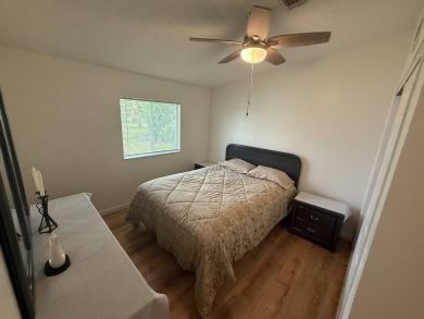 This beautifully renovated 2-bedroom, 2-bathroom, Palm Harbor on Del Tura Golf and Country Club in Florida - for sale on GolfHomes.com, golf home, golf lot