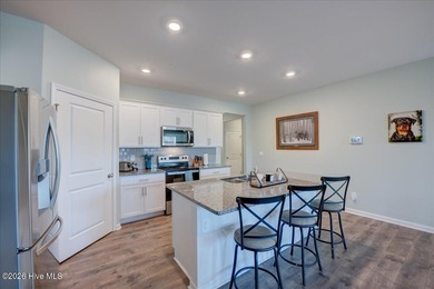 Welcome to 2021 Caracara Drive, located in the gated Fairfield on Harbour Point Golf Club in North Carolina - for sale on GolfHomes.com, golf home, golf lot