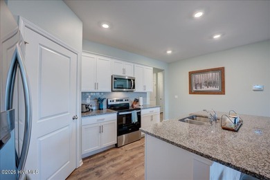 Welcome to 2021 Caracara Drive, located in the gated Fairfield on Harbour Point Golf Club in North Carolina - for sale on GolfHomes.com, golf home, golf lot