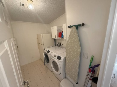 This beautifully renovated 2-bedroom, 2-bathroom, Palm Harbor on Del Tura Golf and Country Club in Florida - for sale on GolfHomes.com, golf home, golf lot