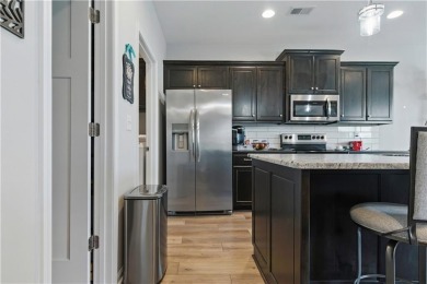 Nestled beside Stone Canyon Golf Course, this immaculate on Stone Canyon Golf Club in Missouri - for sale on GolfHomes.com, golf home, golf lot