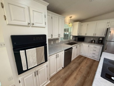 This beautifully renovated 2-bedroom, 2-bathroom, Palm Harbor on Del Tura Golf and Country Club in Florida - for sale on GolfHomes.com, golf home, golf lot