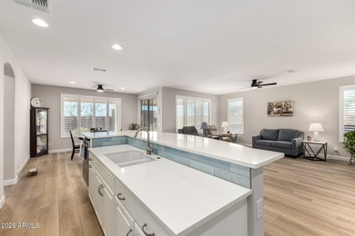 Set within a vibrant resort-style community, this exceptional on Poston Butte Golf Club in Arizona - for sale on GolfHomes.com, golf home, golf lot