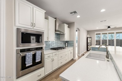 Set within a vibrant resort-style community, this exceptional on Poston Butte Golf Club in Arizona - for sale on GolfHomes.com, golf home, golf lot