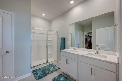 Welcome to 2021 Caracara Drive, located in the gated Fairfield on Harbour Point Golf Club in North Carolina - for sale on GolfHomes.com, golf home, golf lot