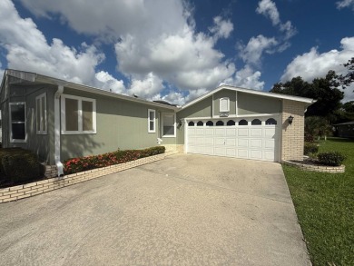 This beautifully renovated 2-bedroom, 2-bathroom, Palm Harbor on Del Tura Golf and Country Club in Florida - for sale on GolfHomes.com, golf home, golf lot