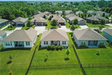 Nestled beside Stone Canyon Golf Course, this immaculate on Stone Canyon Golf Club in Missouri - for sale on GolfHomes.com, golf home, golf lot