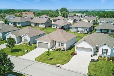 Nestled beside Stone Canyon Golf Course, this immaculate on Stone Canyon Golf Club in Missouri - for sale on GolfHomes.com, golf home, golf lot