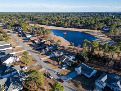 Welcome to 2021 Caracara Drive, located in the gated Fairfield on Harbour Point Golf Club in North Carolina - for sale on GolfHomes.com, golf home, golf lot