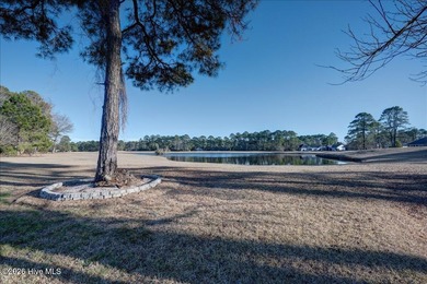 Welcome to 2021 Caracara Drive, located in the gated Fairfield on Harbour Point Golf Club in North Carolina - for sale on GolfHomes.com, golf home, golf lot