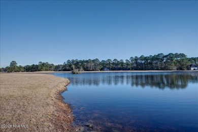Welcome to 2021 Caracara Drive, located in the gated Fairfield on Harbour Point Golf Club in North Carolina - for sale on GolfHomes.com, golf home, golf lot