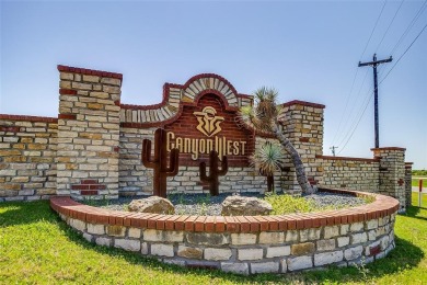 Welcome to your dream home in the prestigious, gated golf course on Canyon West Golf Club in Texas - for sale on GolfHomes.com, golf home, golf lot
